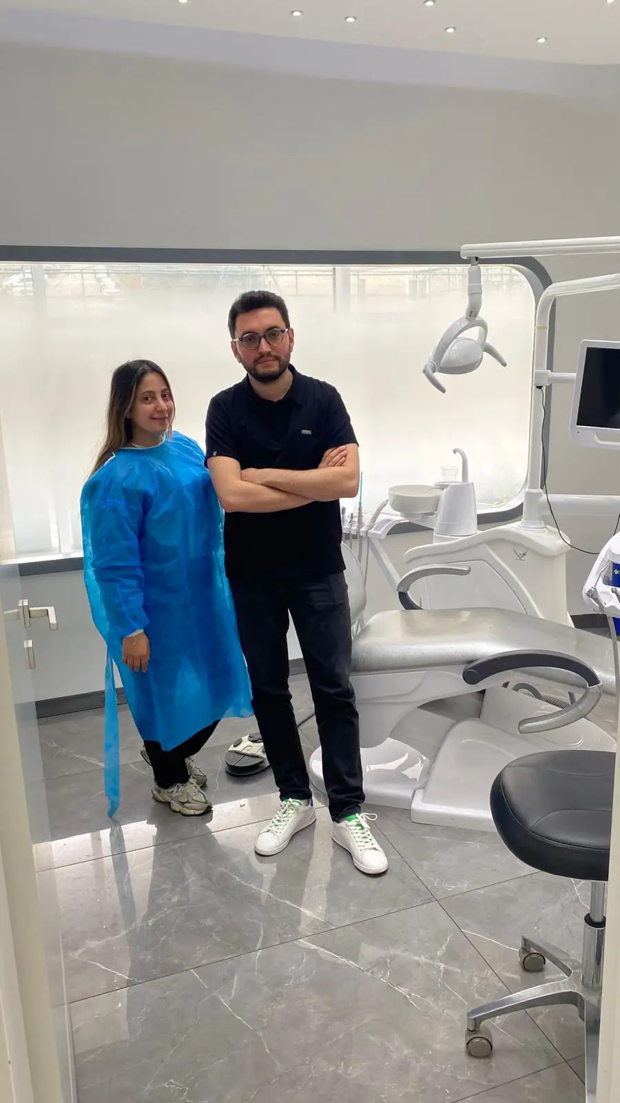 Dental specialists beside a modern dental chair at EsteQuality Clinic in Istanbul.