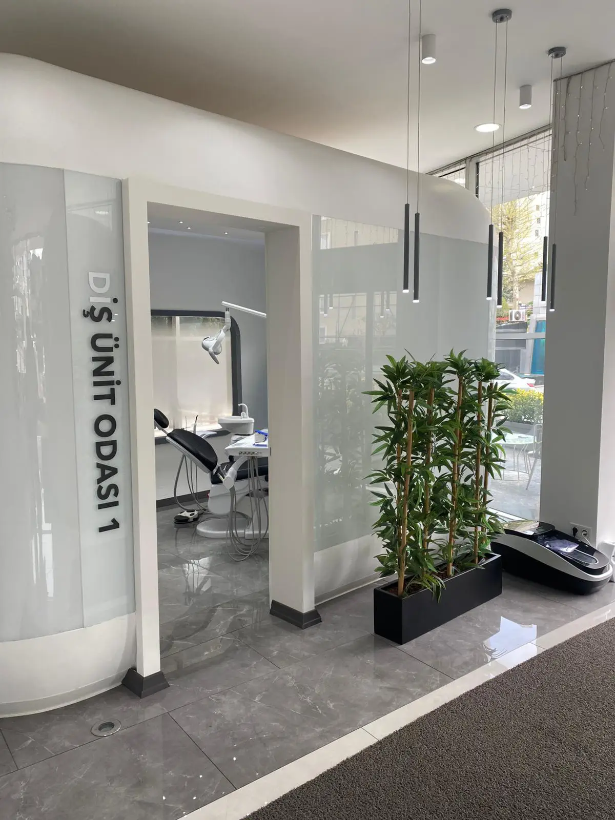 Modern dental treatment room at EsteQuality in Istanbul with dental chair, equipment, and bright clinical interior.