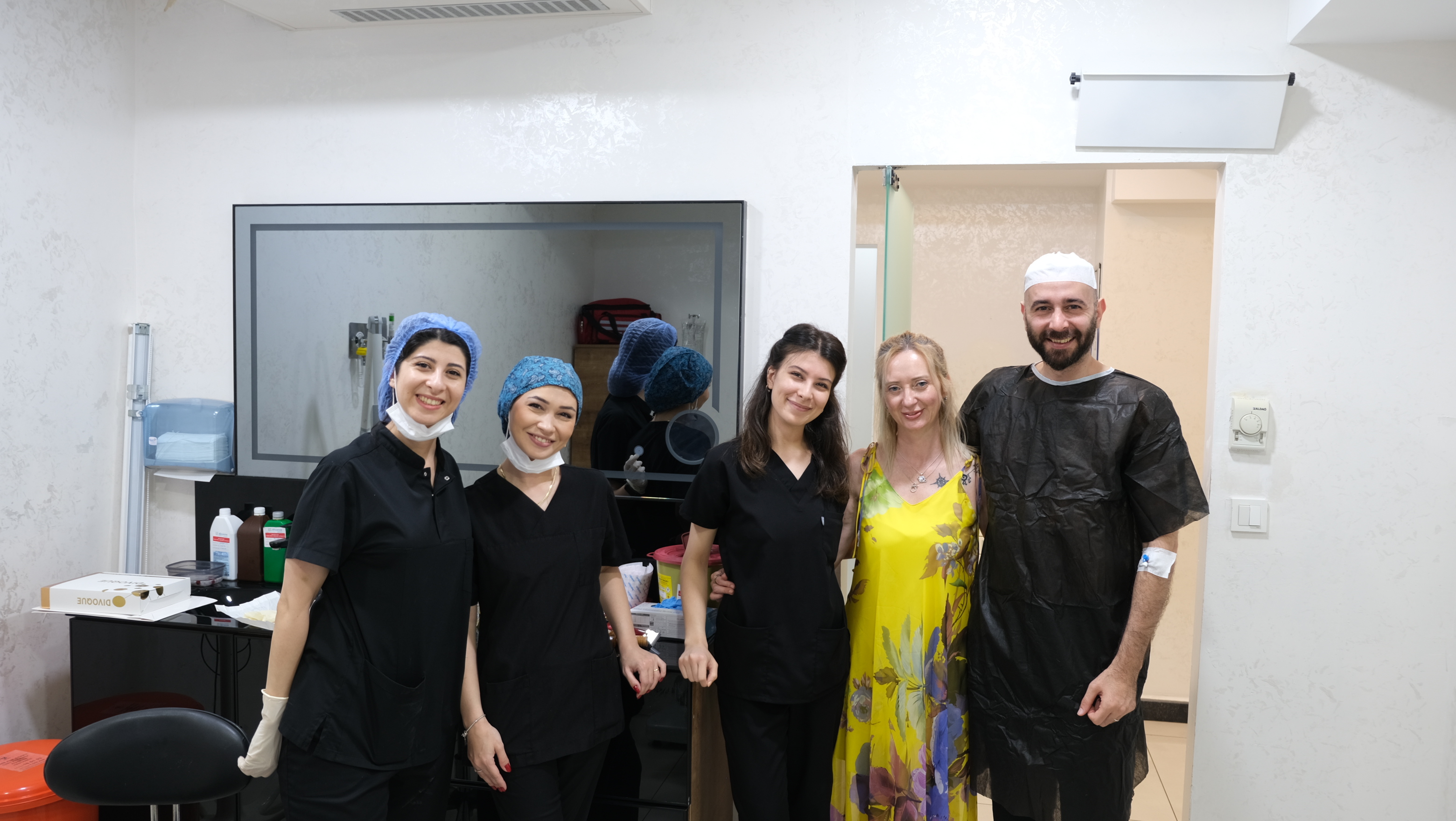 Team photo taken at the EsteQuality clinic on procedure day